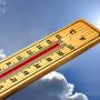 thermometer showing extreme heat with a sunny background