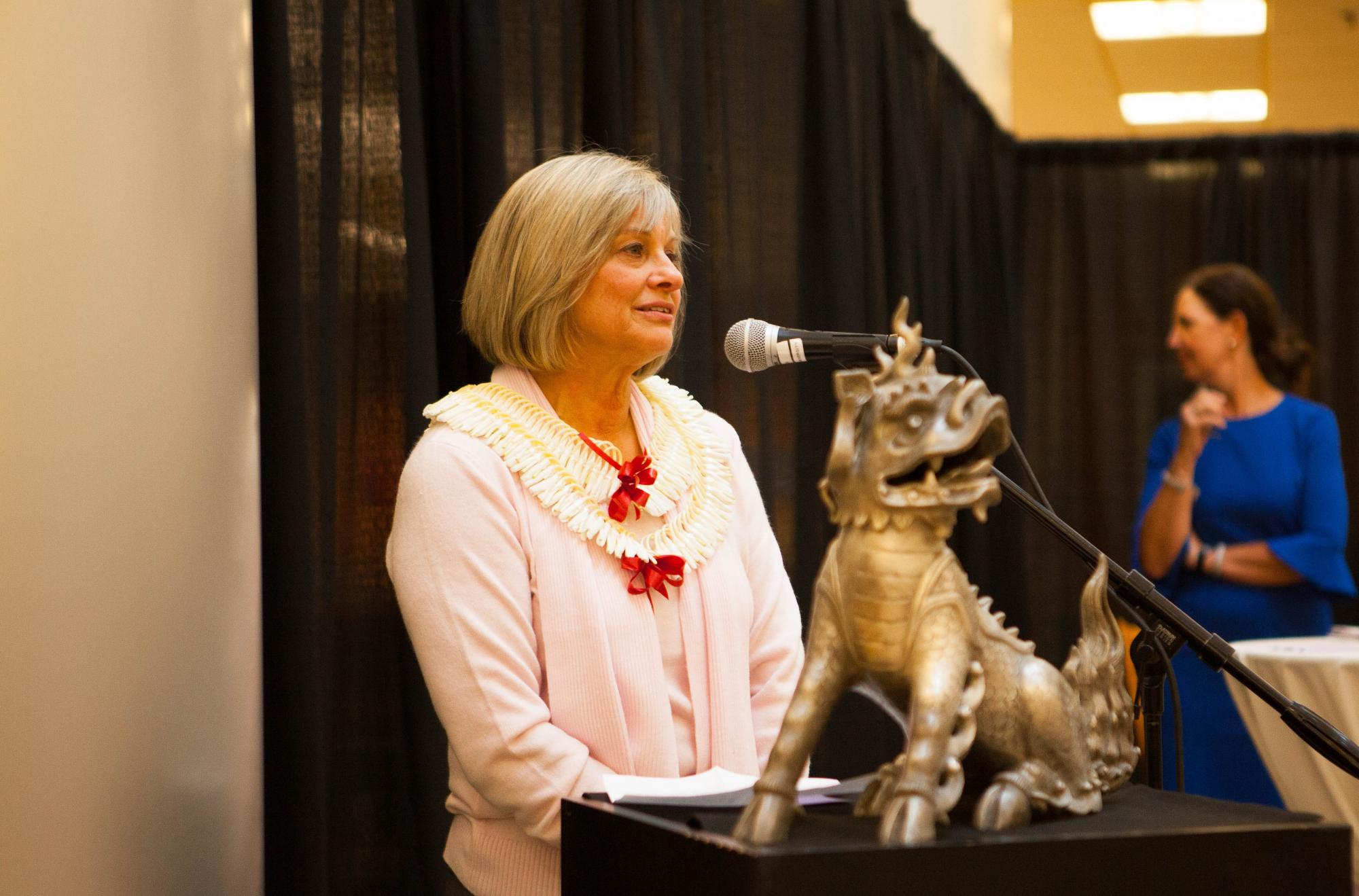 CESS Sr. Director Lois Hornberger with Boxer III statue at her retirement party