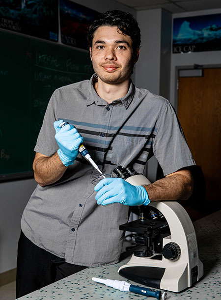 Duncan Anderson '24 Posing In Pacific University Science Lab