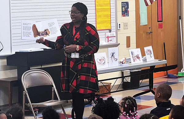 Jocelyn Tubbs Reads Her Book To A Group of Elementary School Students