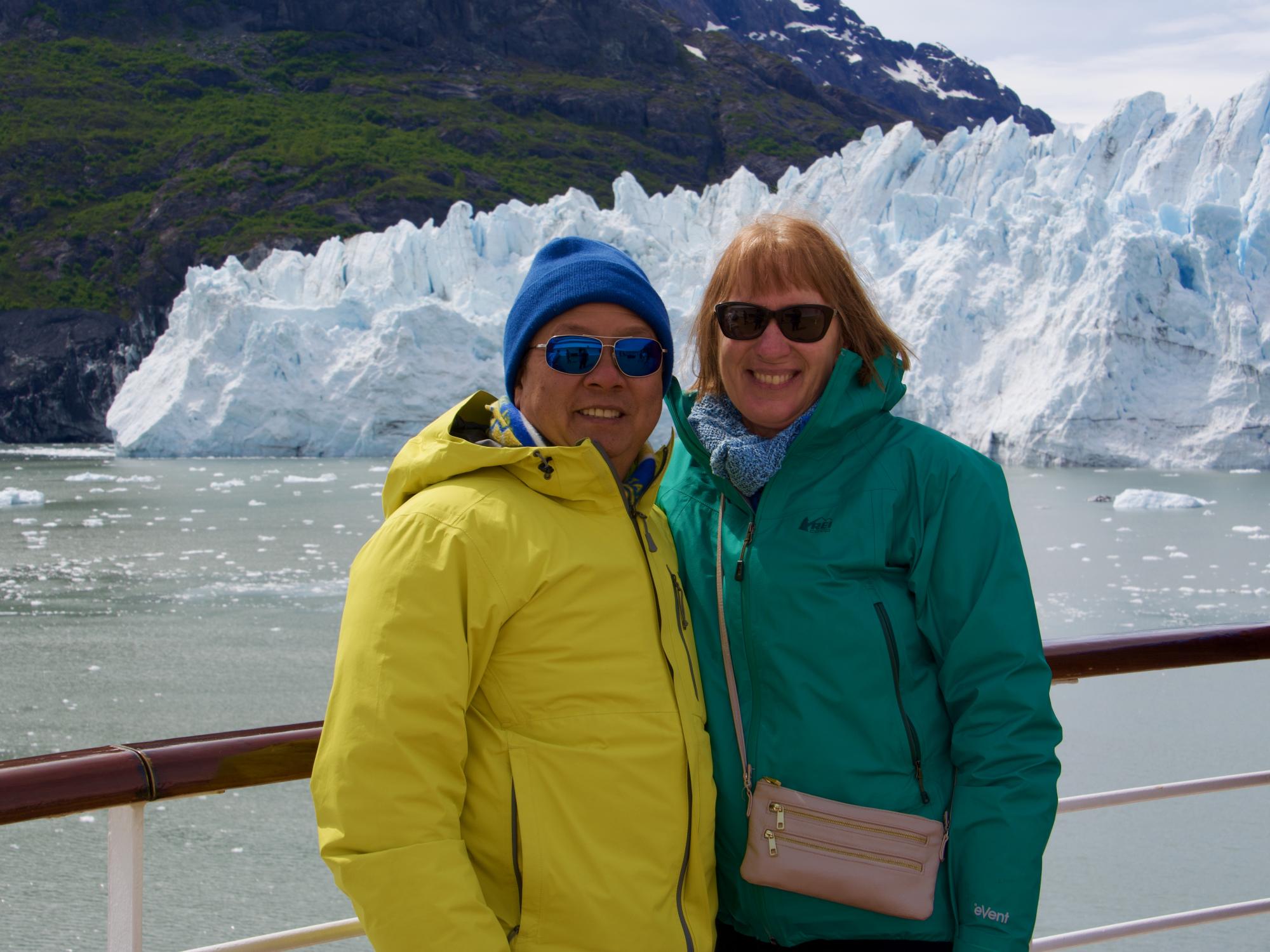 Larry and Kathy Wan in front of a glacier