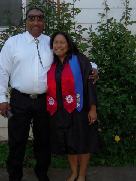 Pride and her father the day she graduated from Pacific
