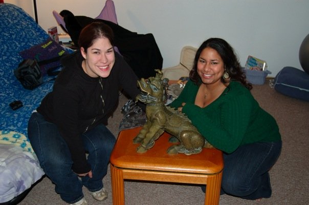 Pride and her sorority sister Tiffany Sorenson '08 pose next to the Boxer statue