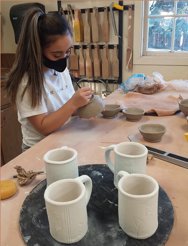 Pacific University ceramic student
