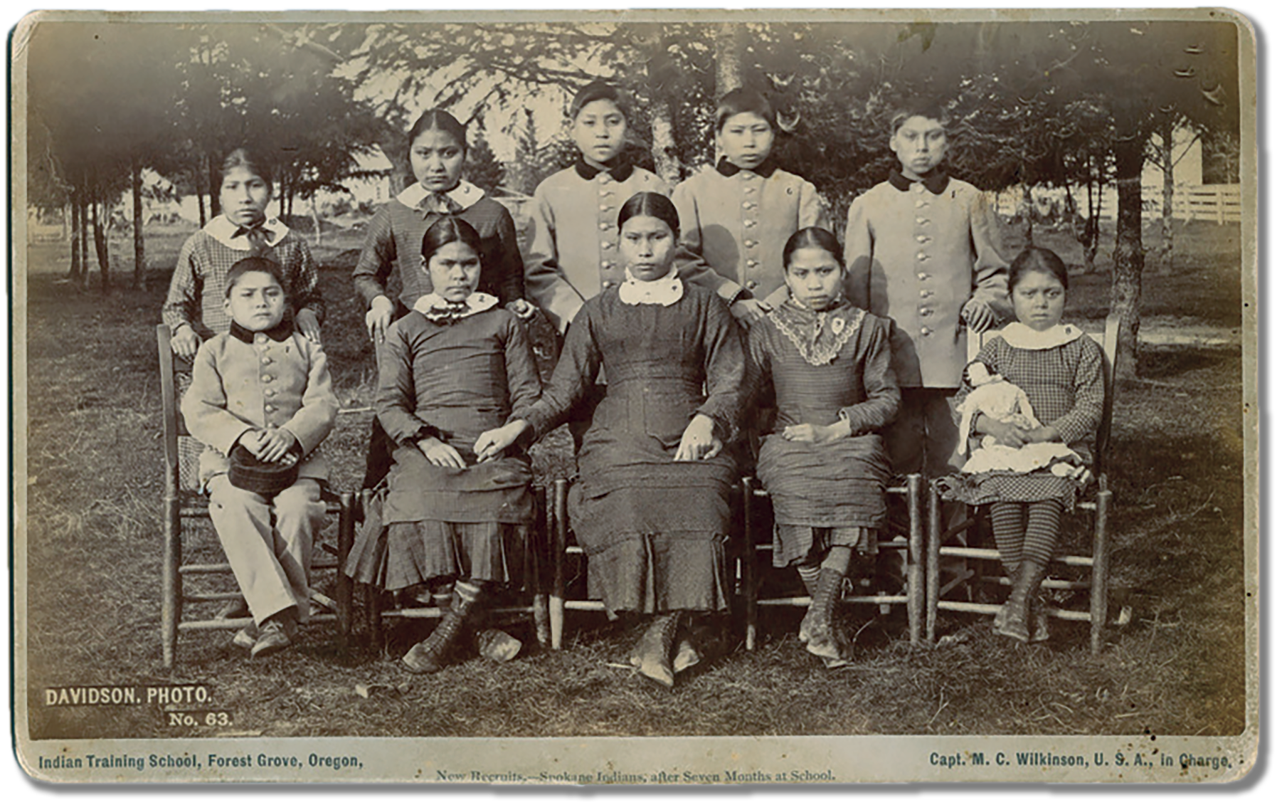 Archival photo of indian training school students in westernized clothing