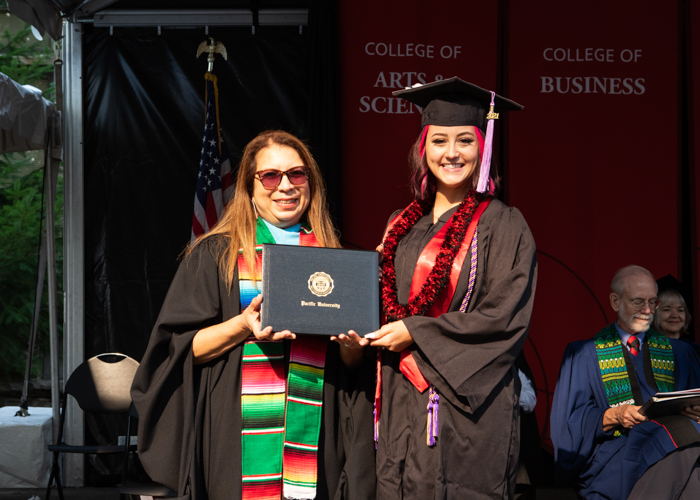Destyne Johnson receives award at August commencement