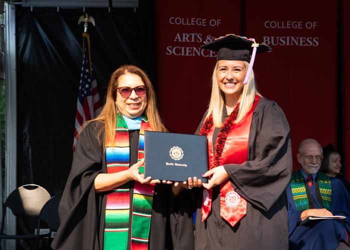 Amanda Musgrave receives award at August commencement