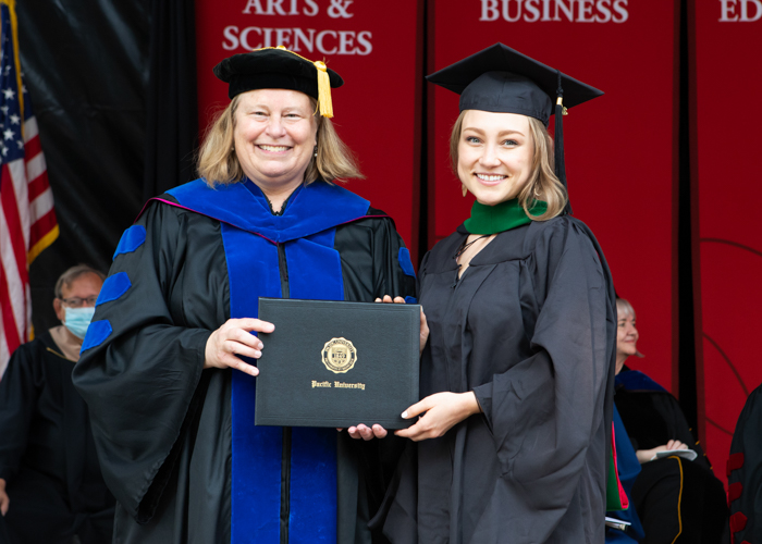 Alexandra Gray receives award at August commencement