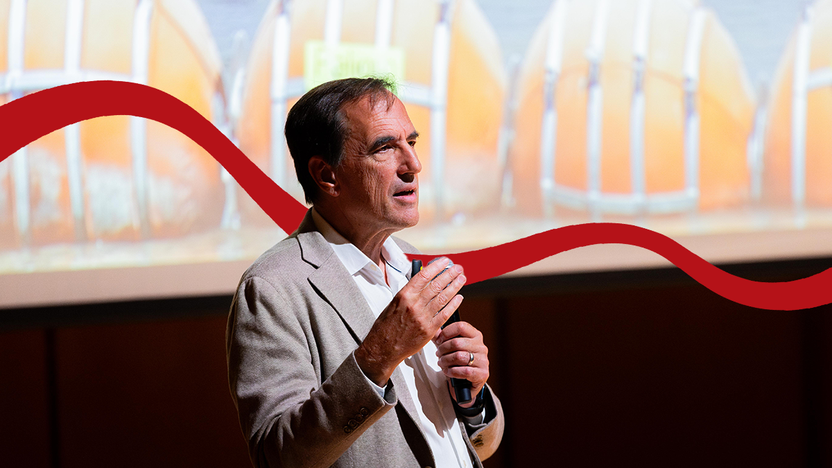 Author and investigative journalist Jeff Goodell speaks on stage at Pacific University.