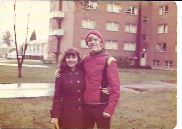 Terry & Alan standing in front of Walter Hall