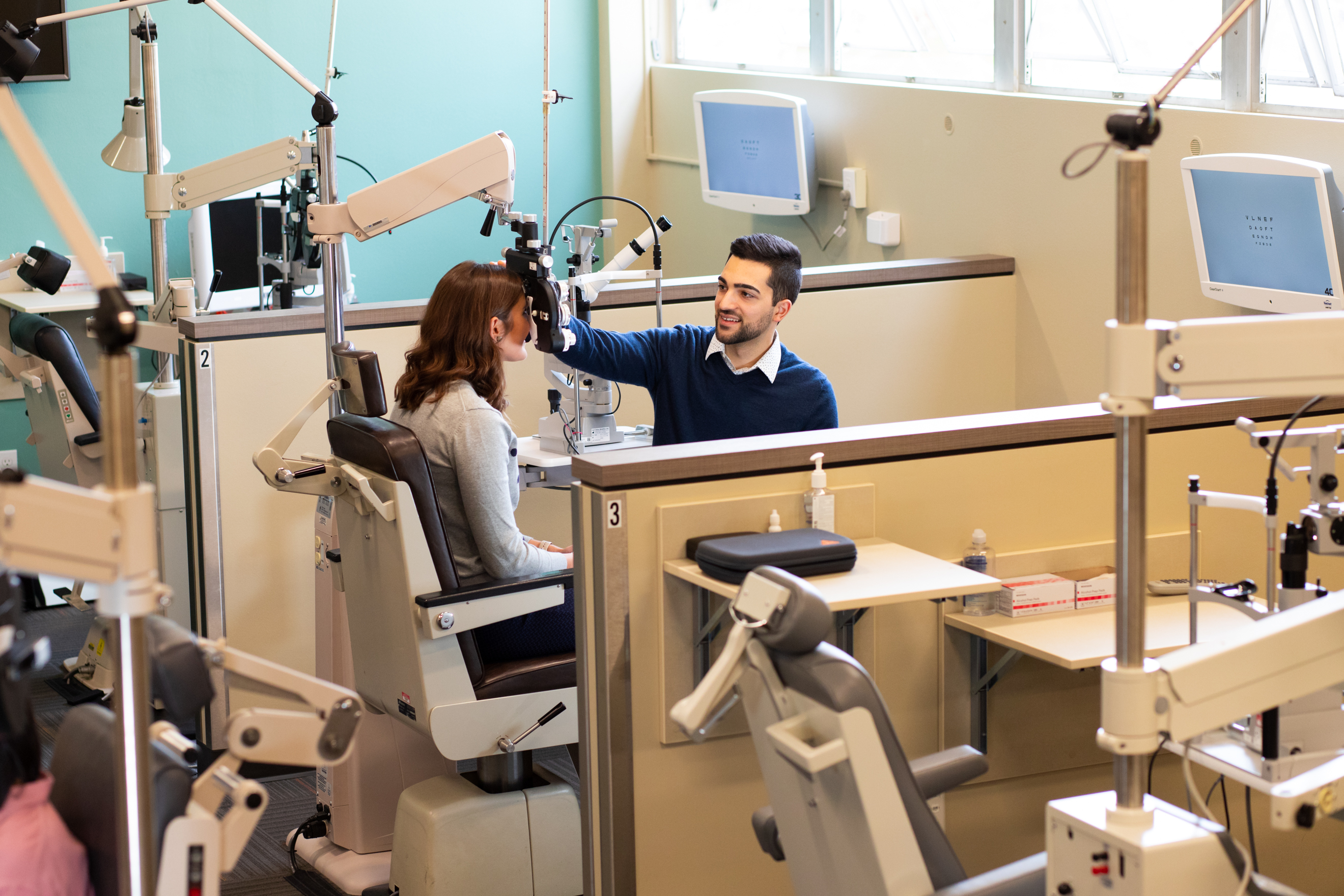 Examining an optometry patient