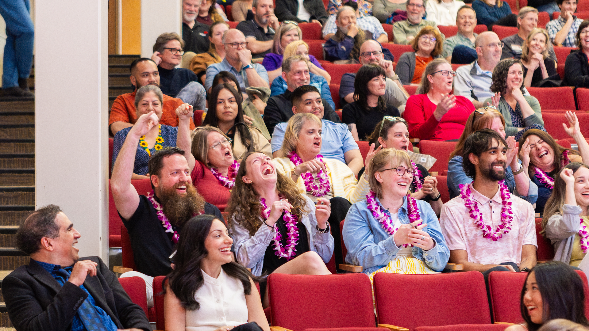 Pacific employees cheer for each other during a community celebration