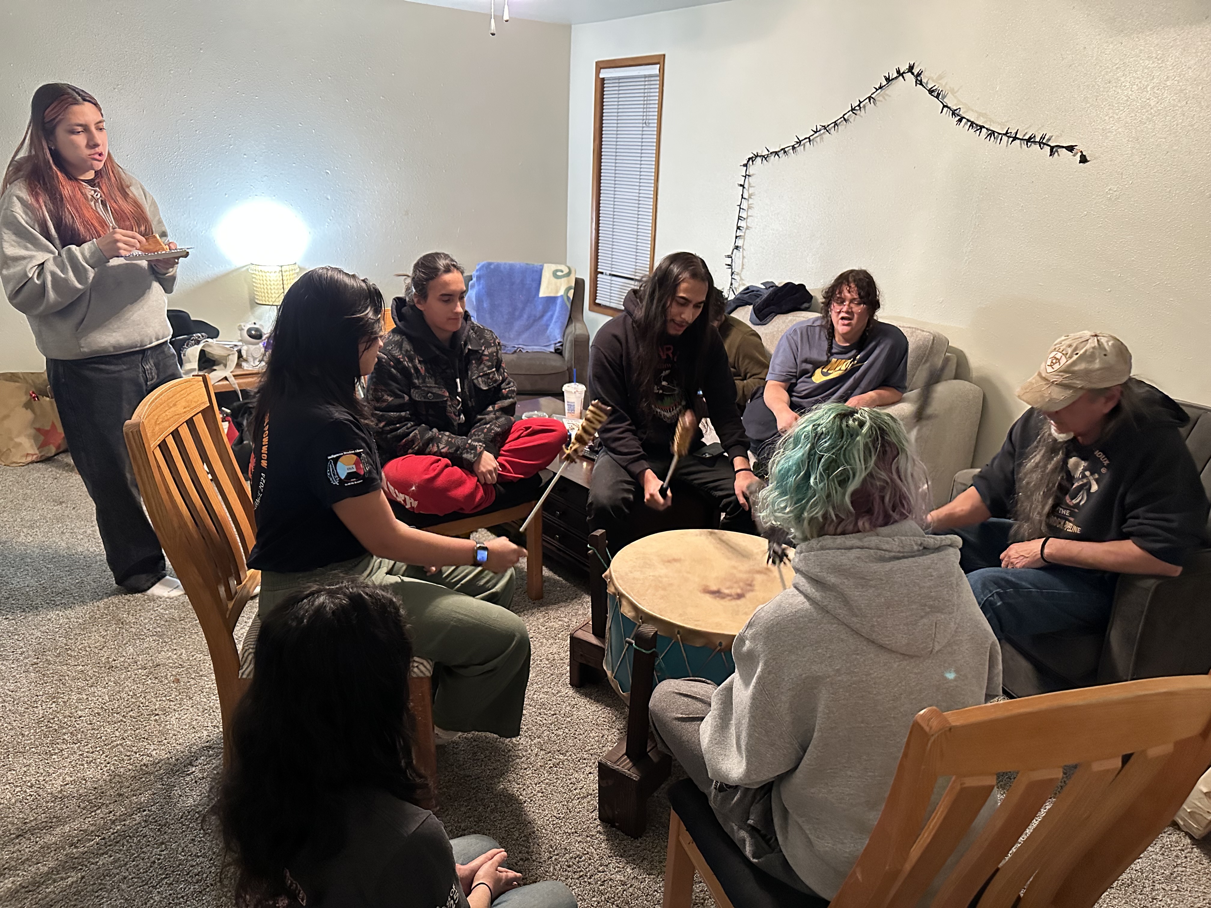 Pacific students in a drum circle