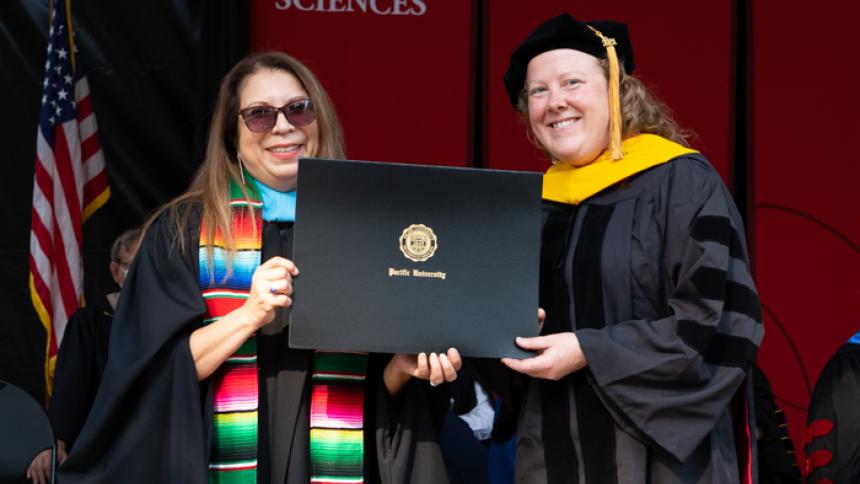 Laurel Fuson-Lang receives award at August commmencement