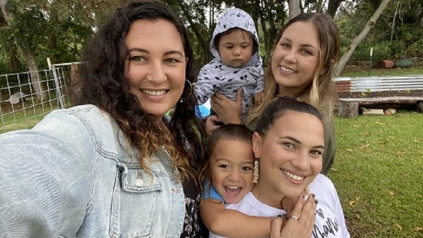 Anuhea Wall '15, MSW '17 with her two sisters and two nephews