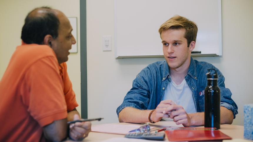 Student talking with an advisor