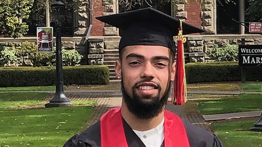 Dante Reid '20 in graduation gown, hat and stole