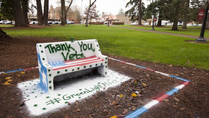 The Spirit Bench on Pacific University's Forest Grove Campus is decorated to celebrate veterans.