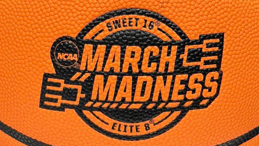 March Madness Logo Stamped On A Basketball
