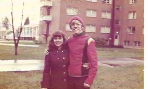 Terry & Alan standing in front of Walter Hall