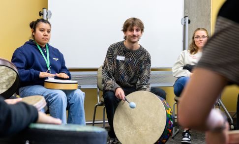 Pacific University students playing drums