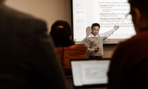Pacific professor Fan Chen teaches during an MBA class.