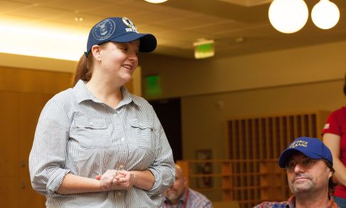 An Air Force veteran speaks to a crowd.