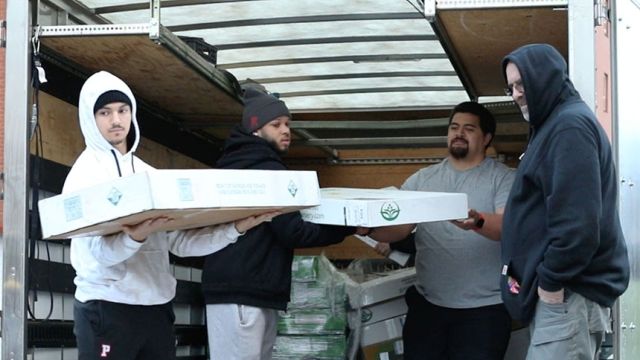 NHOH Members Unloading Country Store Goods Prior To 2023 Lūʻau.