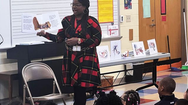 Jocelyn Tubbs Reads Her Book "A Sound Adventure" In A Classroom