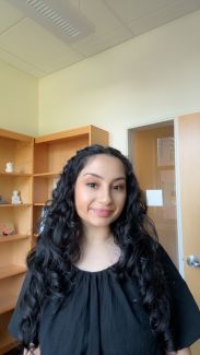 Picture of Dr. Verduzco smiling at the camera in an office