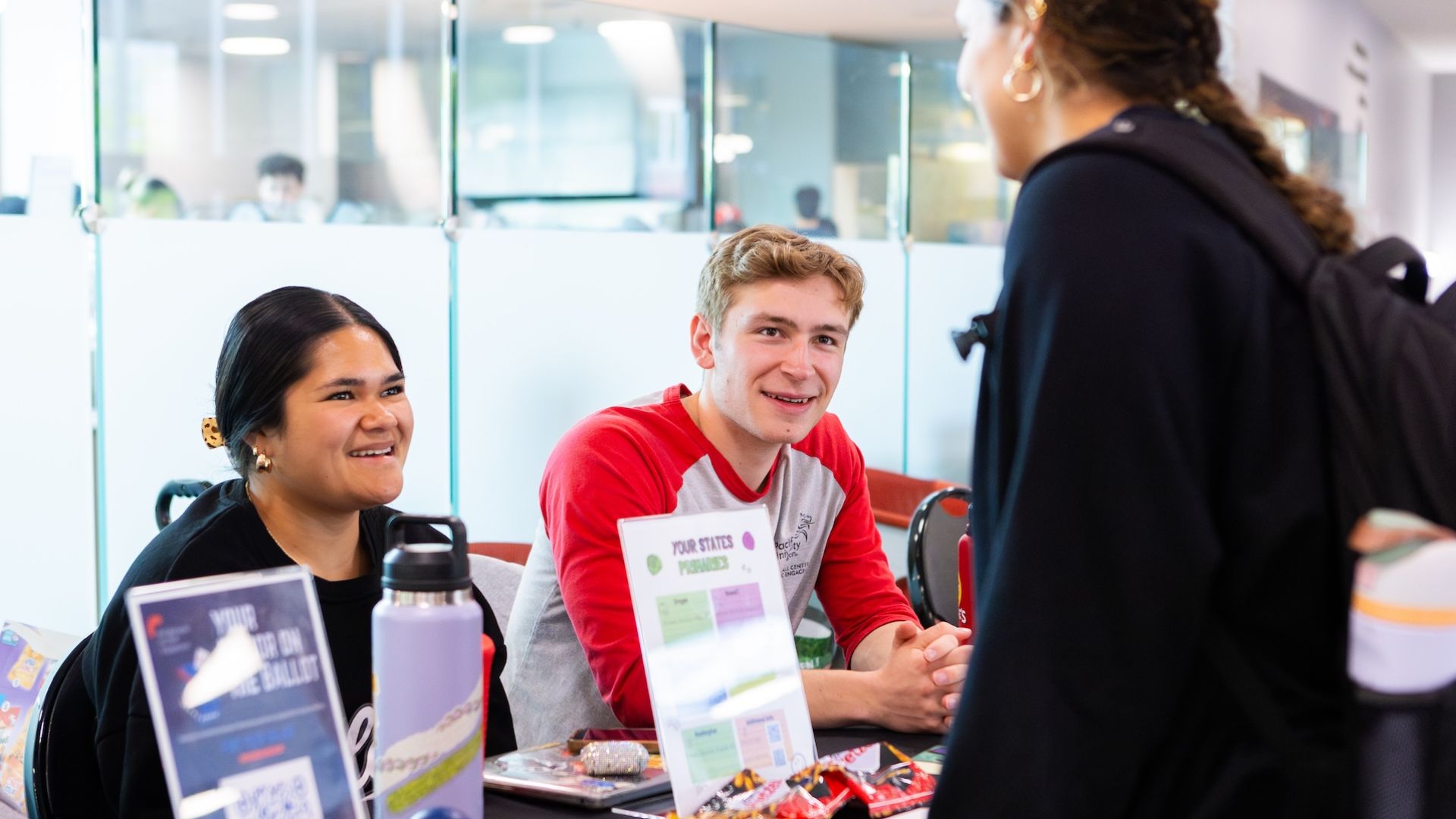 students at a table for voter registration
