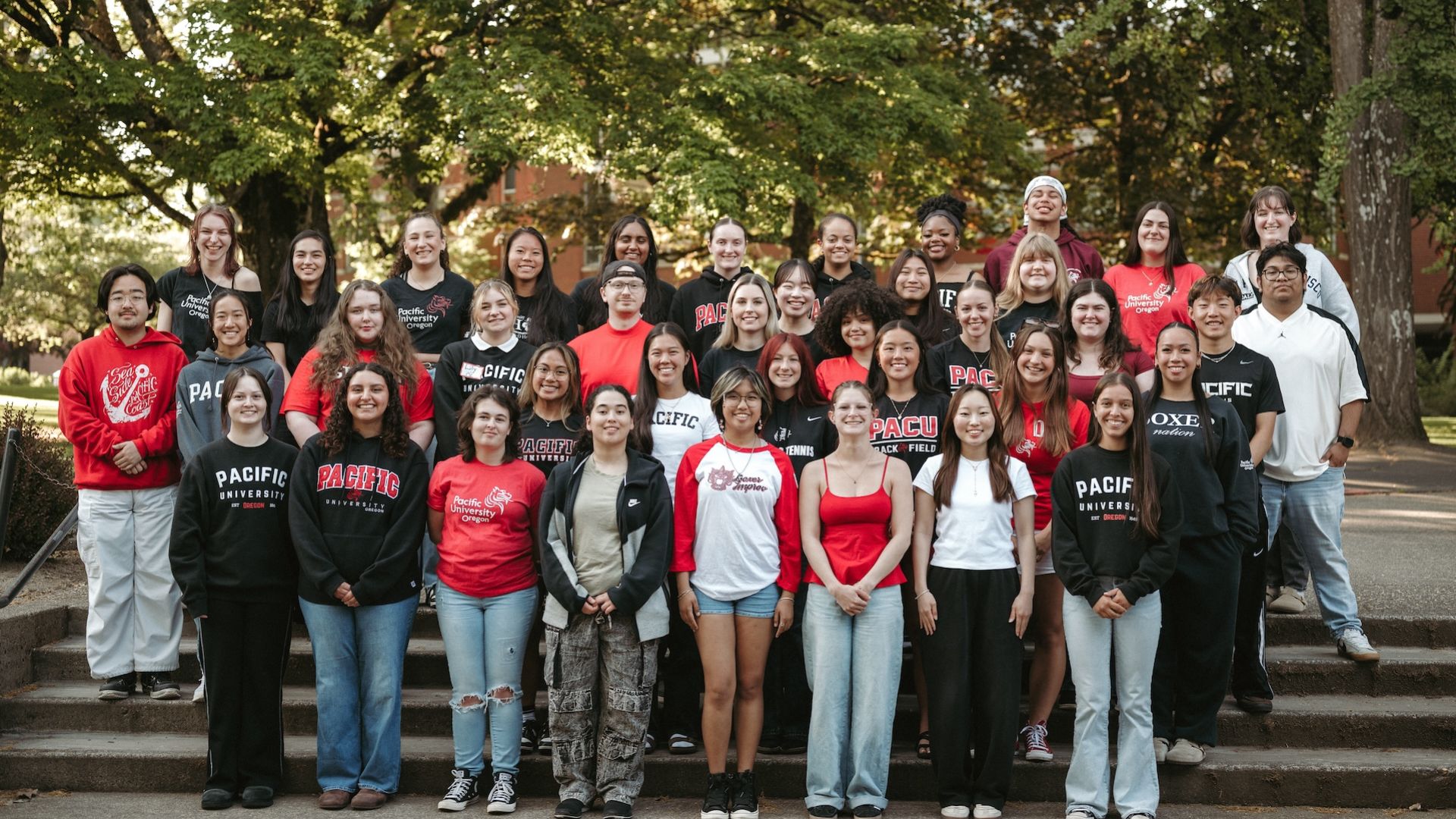 students and staff posing at Orientation