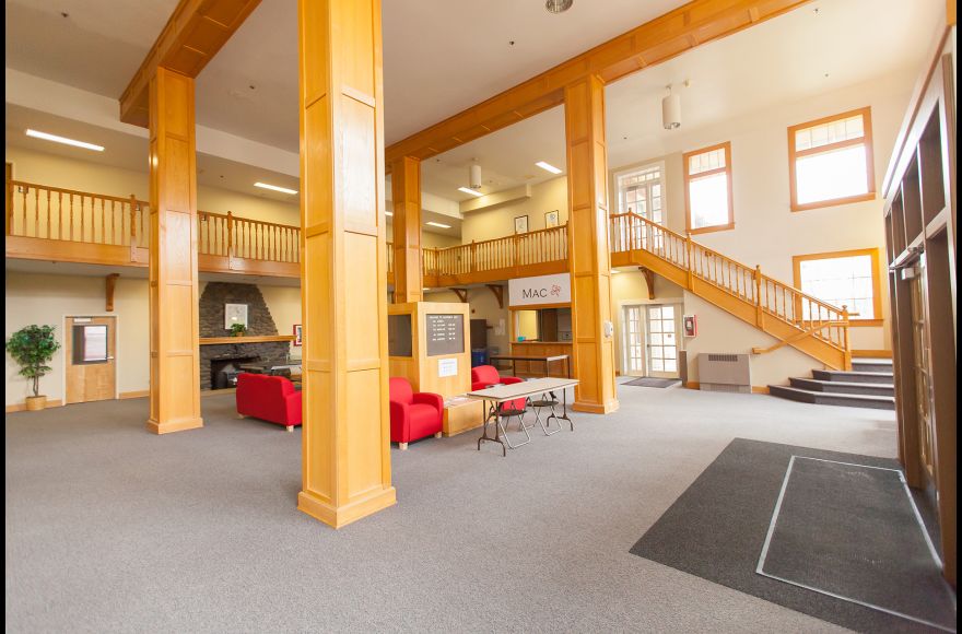 An open balcony overlooks the giant main lounge