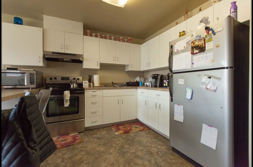 Enjoy private bedrooms with shared living room and kitchen spaces