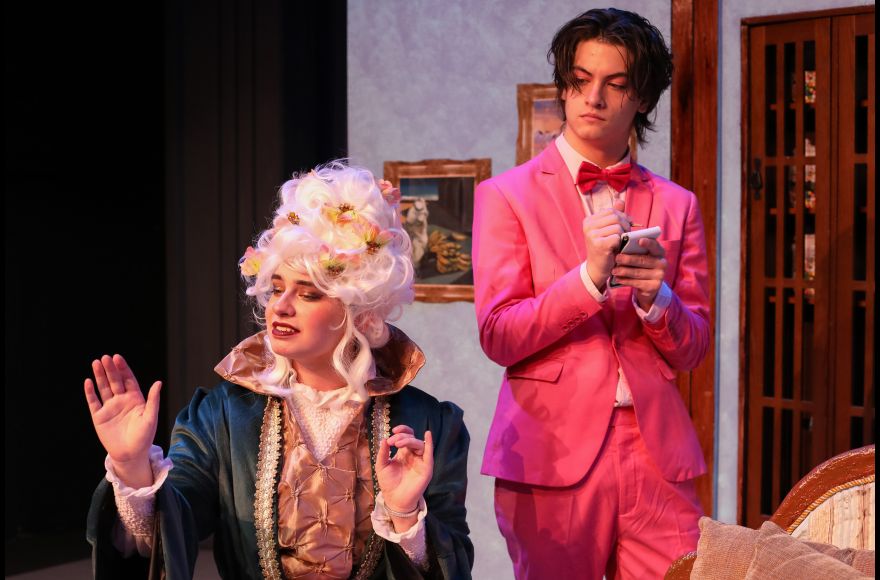 two Pacific University students acting in the production &quot;The Importance of Being Earnest&quot;