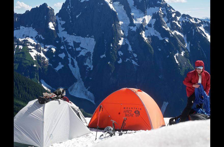 Pacific University student Ted Wogan making camp during Fundamentals of Alpinism course in North Cascades